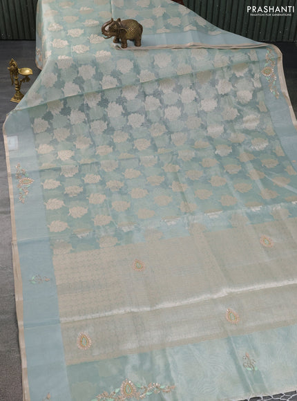 Kota tissue saree teal green shade with zari woven floral buttas and embroidery butta border