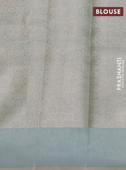 Kota tissue saree teal green shade with zari woven floral buttas and embroidery butta border