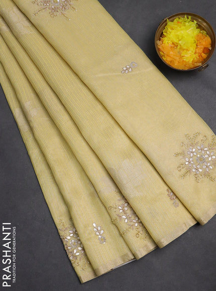 Kota tissue saree yellow with zari woven floral buttas and embroidery butta border