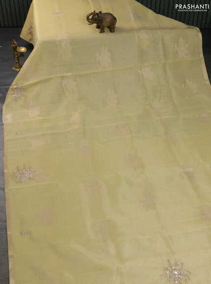 Kota tissue saree yellow with zari woven floral buttas and embroidery butta border