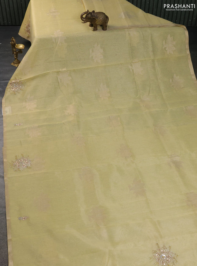 Kota tissue saree yellow with zari woven floral buttas and embroidery butta border