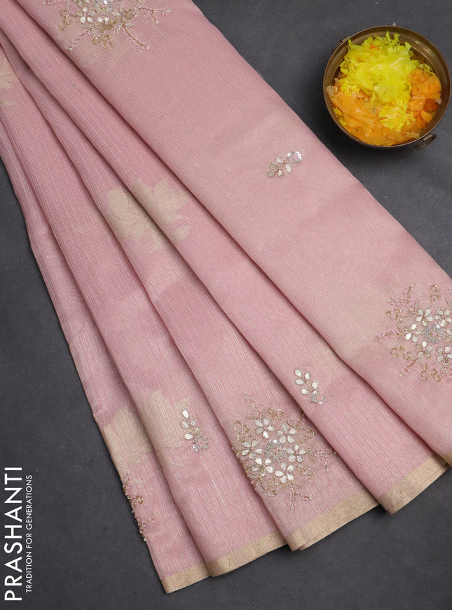 Kota tissue saree light pink with zari woven floral buttas and embroidery butta border