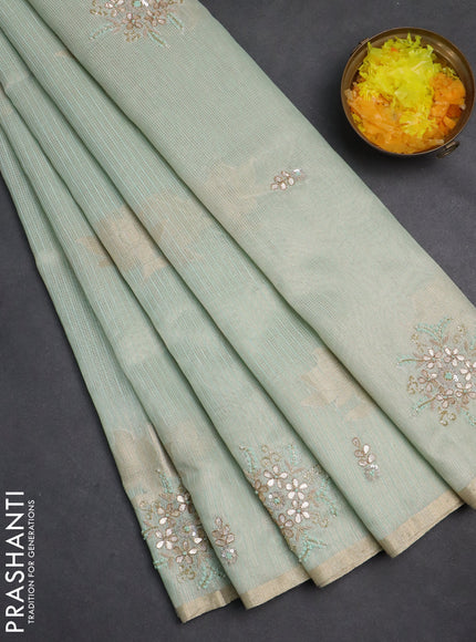 Kota tissue saree teal blue with zari woven floral buttas and embroidery butta border