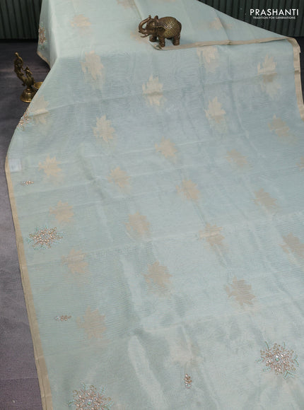 Kota tissue saree teal blue with zari woven floral buttas and embroidery butta border