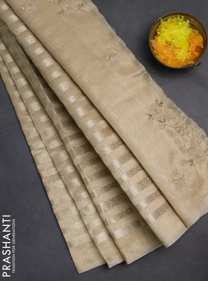 Kota tissue saree beige with allover zari weaves and embroidery butta border