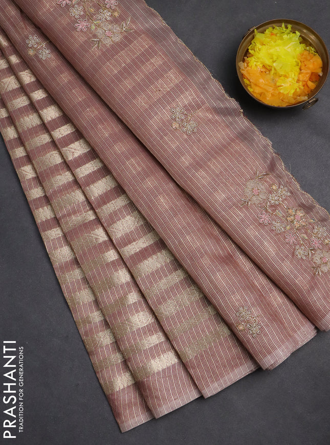 Kota tissue saree pastel maroon with allover zari weaves and embroidery butta border