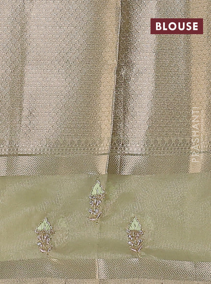 Kota tissue saree pista green with allover zari weaves and zari woven embroidery butta border