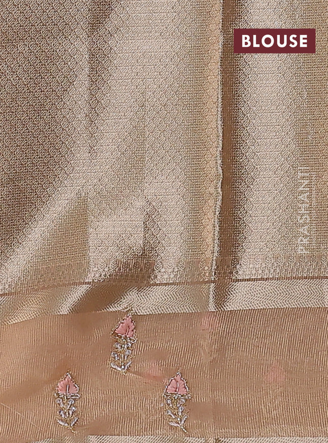 Kota tissue saree orange with allover zari weaves and zari woven embroidery butta border