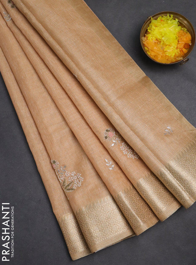 Kota tissue saree pale orange with embroidery buttas and zari woven border