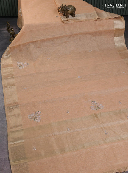 Kota tissue saree pale orange with embroidery buttas and zari woven border