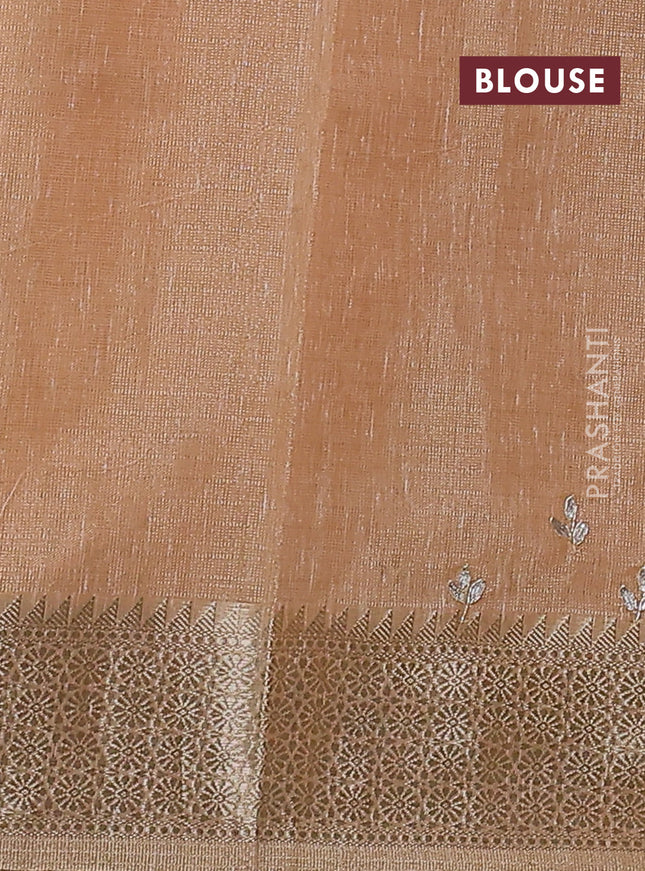 Kota tissue saree pale orange with embroidery buttas and zari woven border