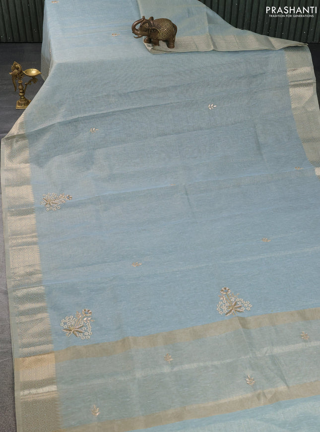 Kota tissue saree teal blue with embroidery buttas and zari woven border