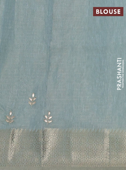 Kota tissue saree teal blue with embroidery buttas and zari woven border