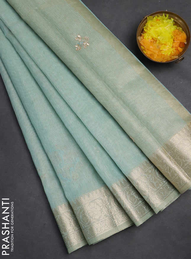 Kota tissue saree teal blue with embroidery buttas and zari woven border