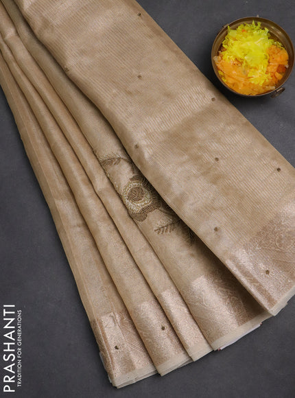 Kota tissue saree beige with embroidery buttas and zari woven border