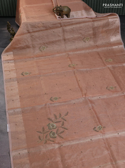 Kota tissue saree peach shade with embroidery buttas and zari woven border