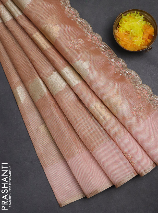 Kota tissue saree peach shade with zari woven buttas and embroidery butta border