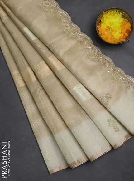 Kota tissue saree pista green with zari woven buttas and embroidery butta border