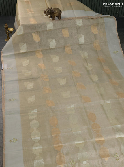 Kota tissue saree pista green with zari woven buttas and embroidery butta border