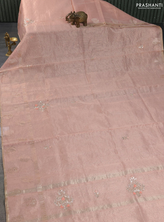 Kota tissue saree peach shade with embroidery buttas and zari woven floral butta border