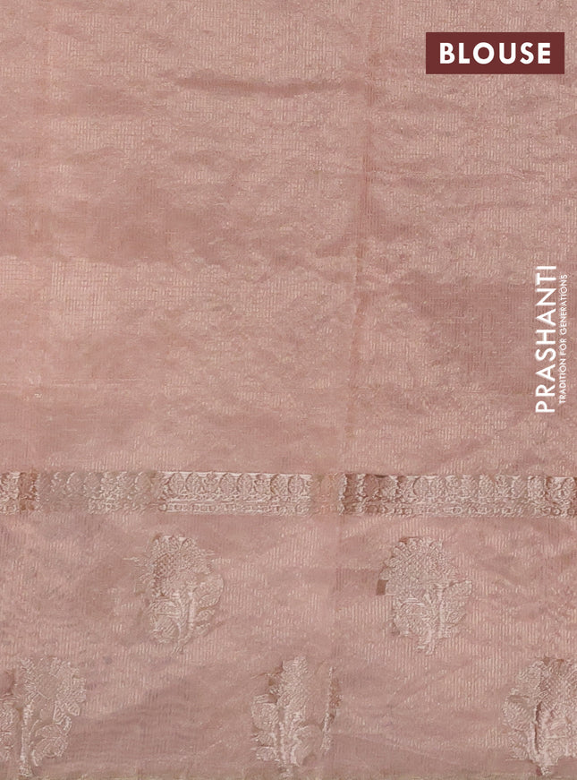 Kota tissue saree peach shade with embroidery buttas and zari woven floral butta border