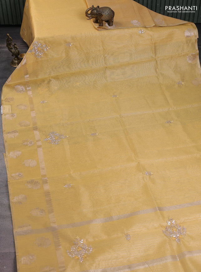 Kota tissue saree yellow with embroidery buttas and zari woven floral butta border