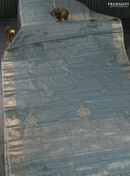 Kota tissue saree pastel blue with embroidery buttas and zari woven border