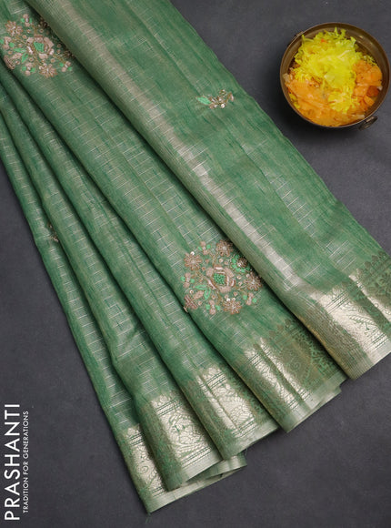 Kota tissue saree green shade with embroidery buttas and zari woven border