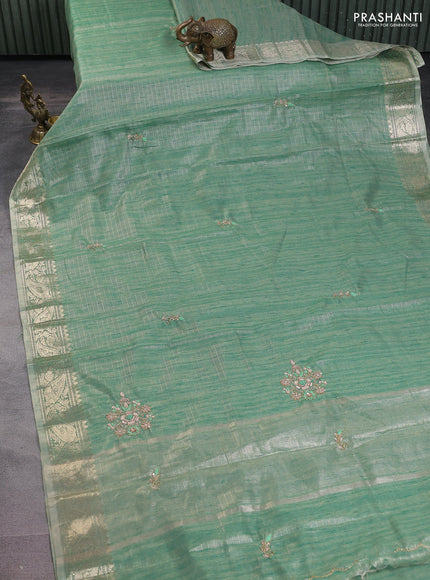 Kota tissue saree green shade with embroidery buttas and zari woven border