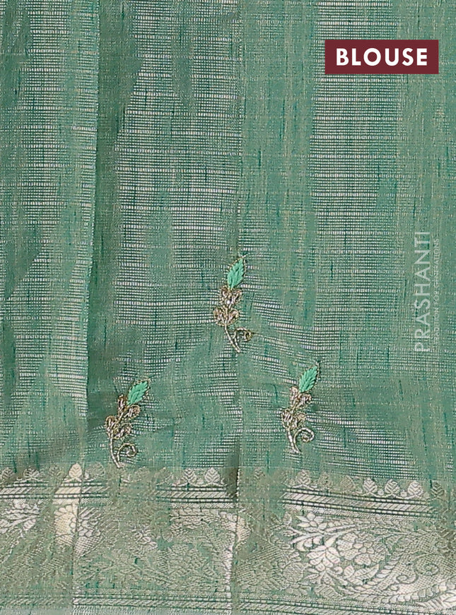 Kota tissue saree green shade with embroidery buttas and zari woven border