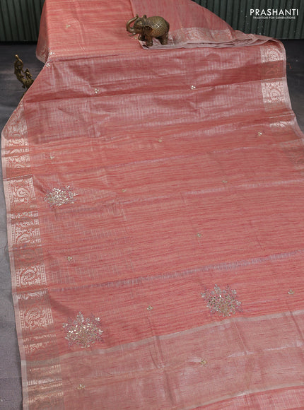 Kota tissue saree pastel peach with allover zari weaves embroidery buttas and zari woven embroidery butta border