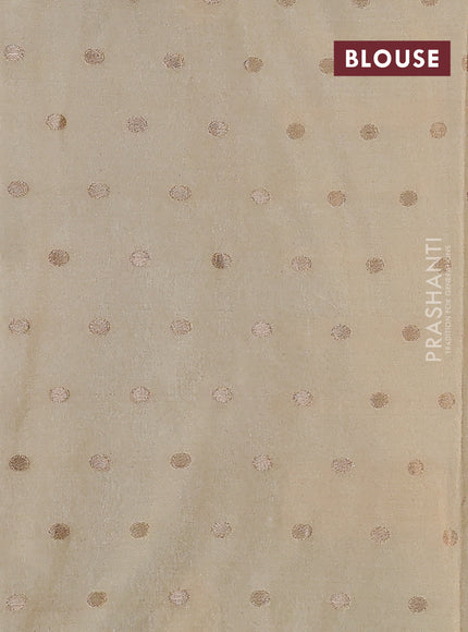 Kota tissue saree beige with allover zari weaves & embroidery buttas and zari woven embroidery butta border
