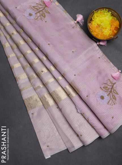 Kota tissue saree mild lavendar with allover zari weaves & embroidery buttas and zari woven embroidery butta border