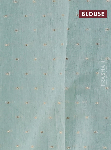 Kota tissue saree teal green with allover zari weaves & embroidery buttas and zari woven embroidery butta border