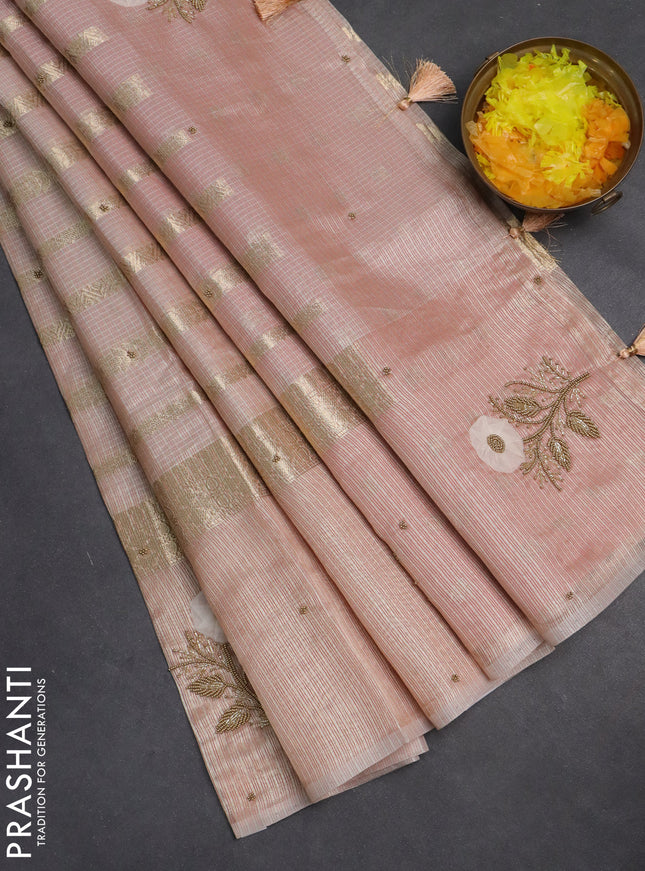 Kota tissue saree peach shade with allover zari weaves & embroidery buttas and zari woven embroidery butta border