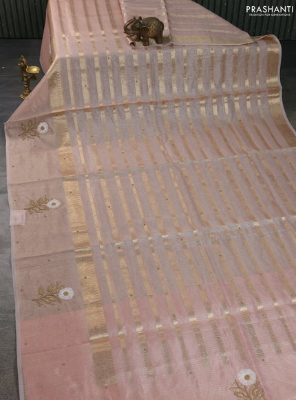 Kota tissue saree peach shade with allover zari weaves & embroidery buttas and zari woven embroidery butta border