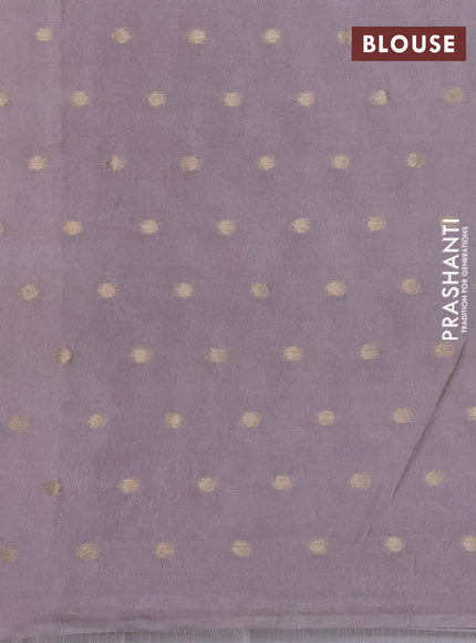 Kota tissue saree pastel lavender with allover zari weaves & embroidery buttas and zari woven embroidery butta border