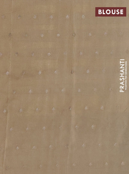 Kota tissue saree mild pista green and sandal with allover zari weaves & embroidery buttas and zari woven embroidery butta border