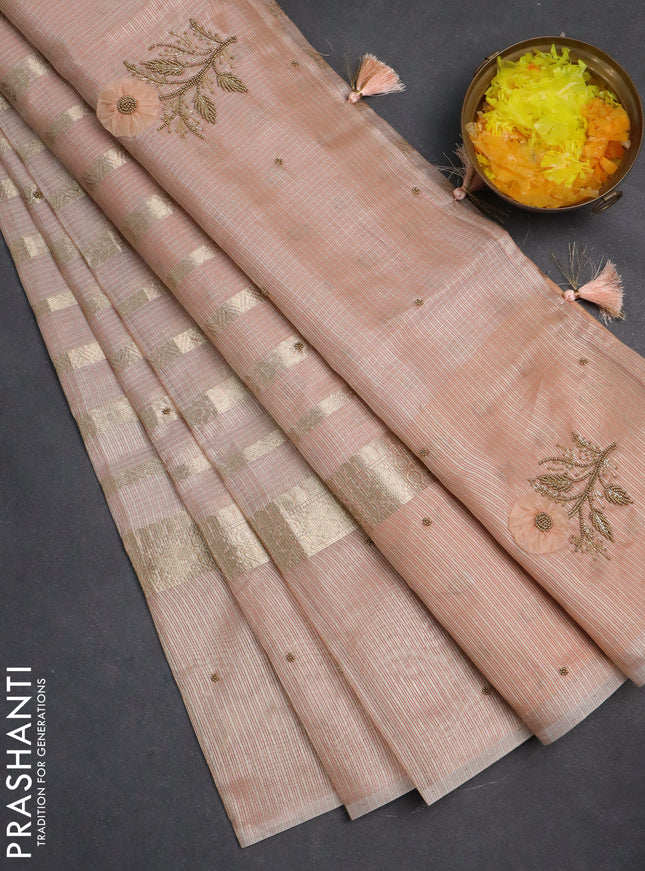 Kota tissue saree peach shade with allover zari weaves & embroidery buttas and zari woven embroidery butta border