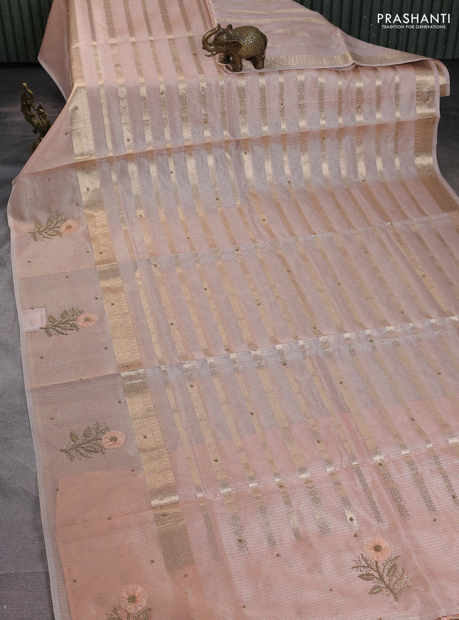 Kota tissue saree peach shade with allover zari weaves & embroidery buttas and zari woven embroidery butta border