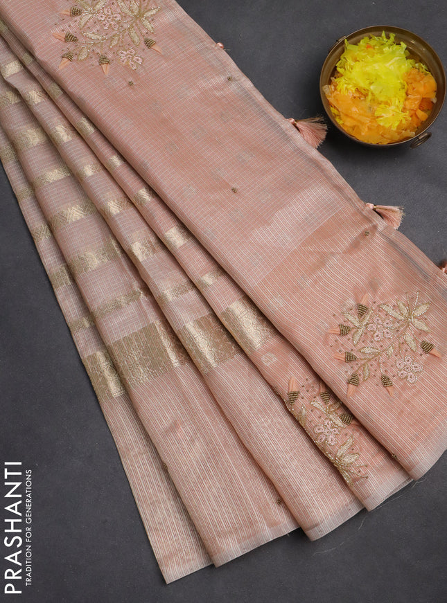 Kota tissue saree peach shade with allover zari weaves & embroidery buttas and embroidery butta border