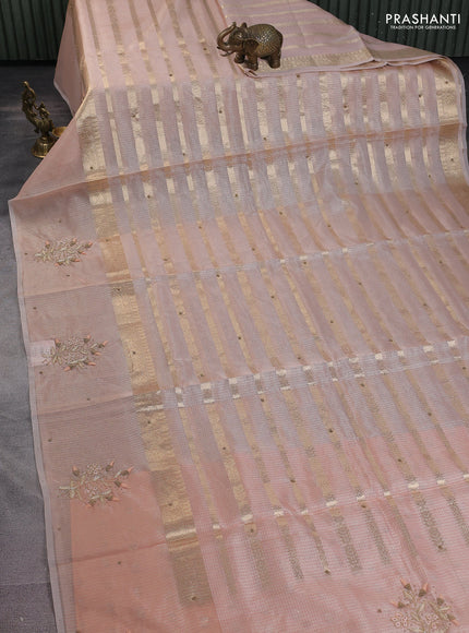 Kota tissue saree peach shade with allover zari weaves & embroidery buttas and embroidery butta border