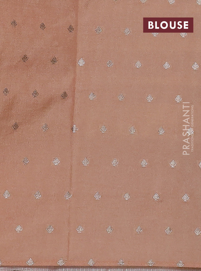 Kota tissue saree peach shade with allover zari weaves & embroidery buttas and embroidery butta border