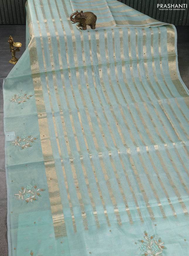 Kota tissue saree teal green with allover zari weaves & embroidery buttas and embroidery butta border