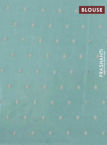 Kota tissue saree teal green with allover zari weaves & embroidery buttas and embroidery butta border