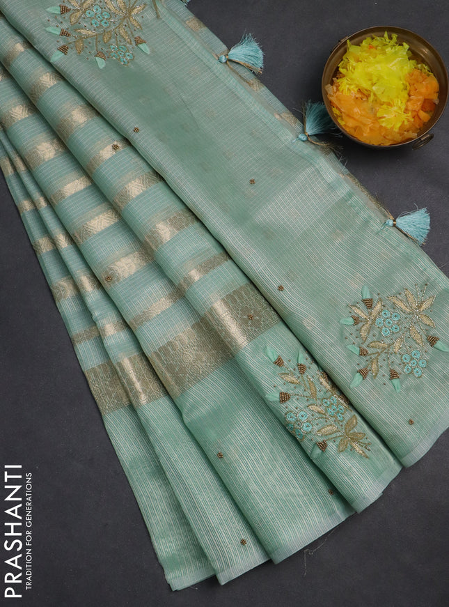 Kota tissue saree teal green with allover zari weaves & embroidery buttas and embroidery butta border