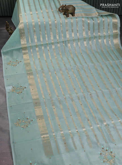 Kota tissue saree teal green with allover zari weaves & embroidery buttas and embroidery butta border