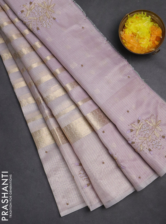 Kota tissue saree mild lavendar with allover zari weaves & embroidery buttas and embroidery butta border