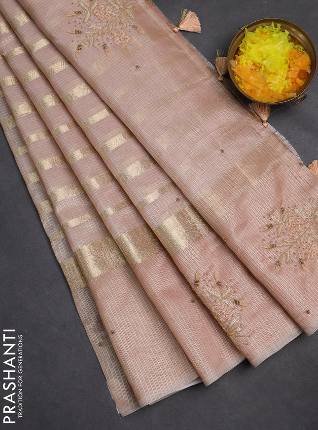 Kota tissue saree pastel pink with allover zari weaves & embroidery buttas and embroidery butta border