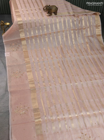 Kota tissue saree pastel pink with allover zari weaves & embroidery buttas and embroidery butta border